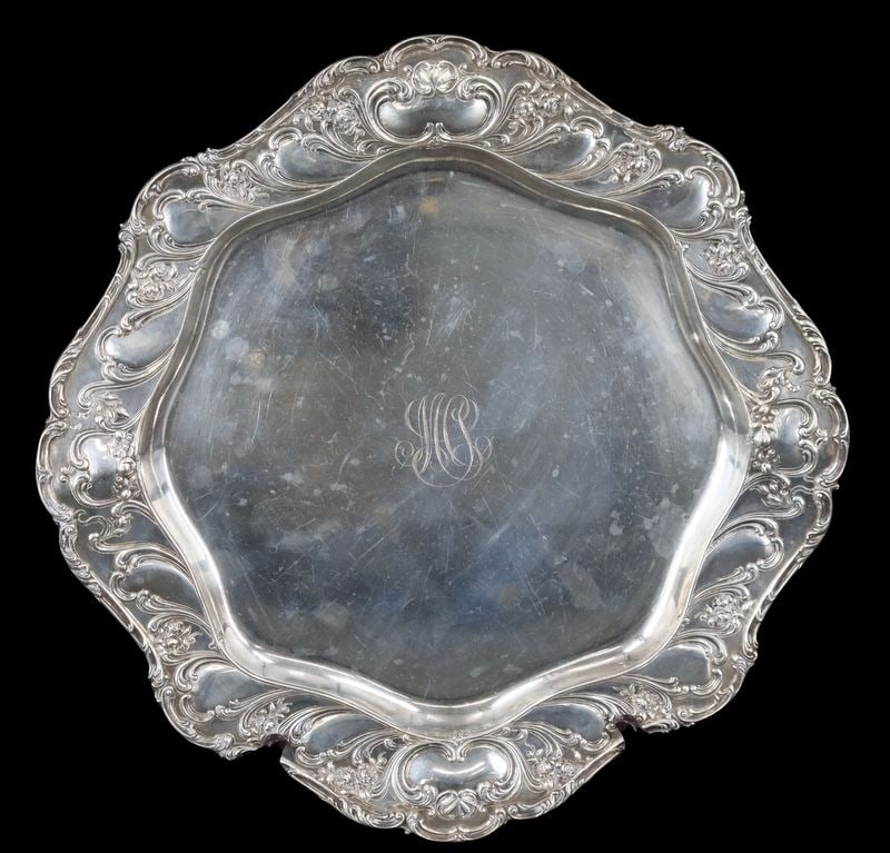 STERLING. Large Gorham Sterling Tray.: A monogrammed Gorham sterling round tray featuring a ruffled border and a floral design executed in repousse, retailed by Spaulding & Co., Chicago. Stamped verso, "Gorham Sterling A586A"