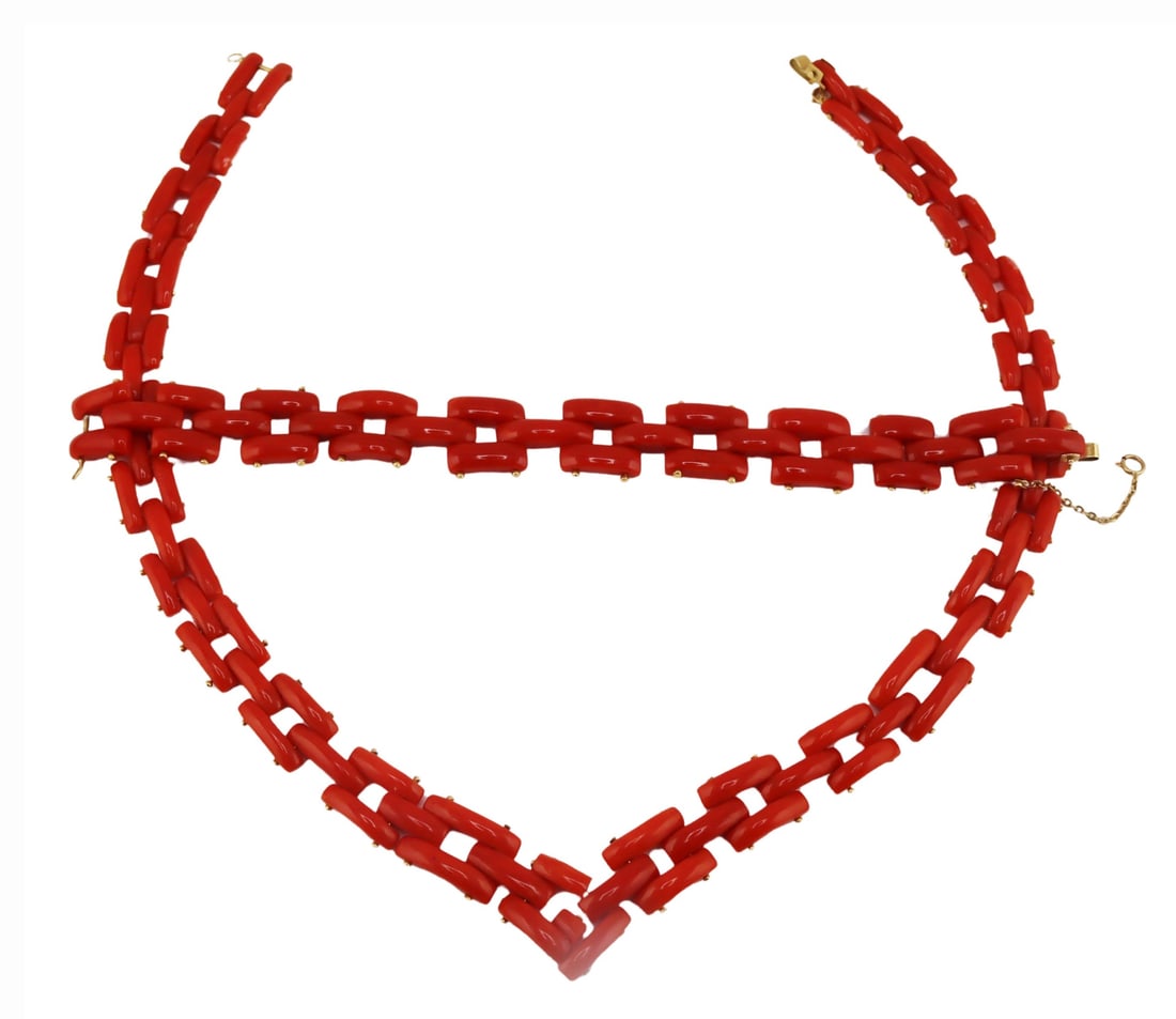 JEWELRY. 18kt Gold and Carved Coral Chain Link: Jewelry. Includes a carved coral articulated link necklace with 18kt gold mounts and clasp; and a matched carved coral articulated link bracelet with 18kt yellow gold mounts and clasp. Each piece is s