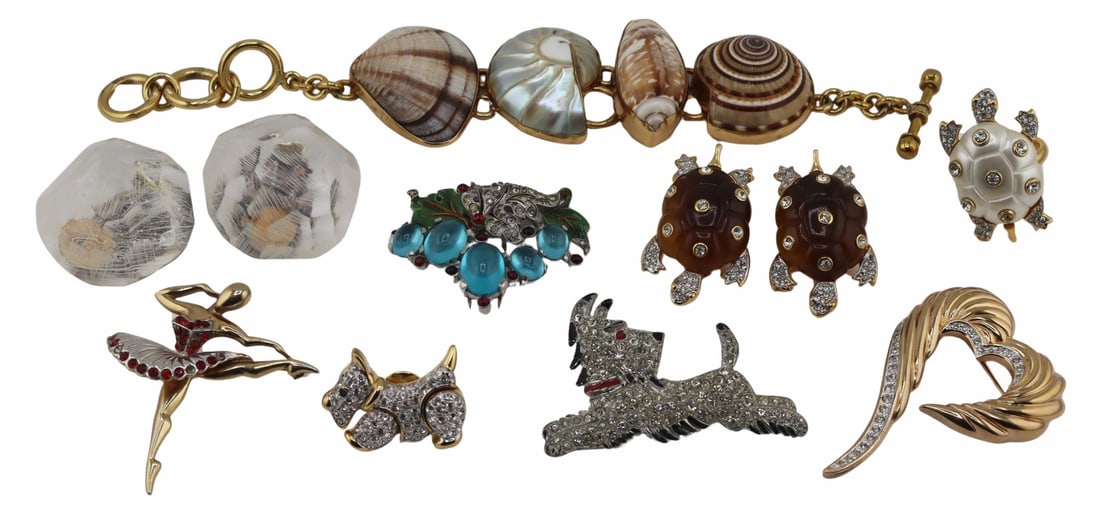 JEWELRY. 11 Pcs. of Costume Jewelry Inc. Trifari.: Includes an Alfred Philippe for Trifari "jelly belly" cabochon fur clip - signed verso; a pair of Monies ear clips; a KJL gold-tone and rhinestone turtle ring - missing one rhinestone, size