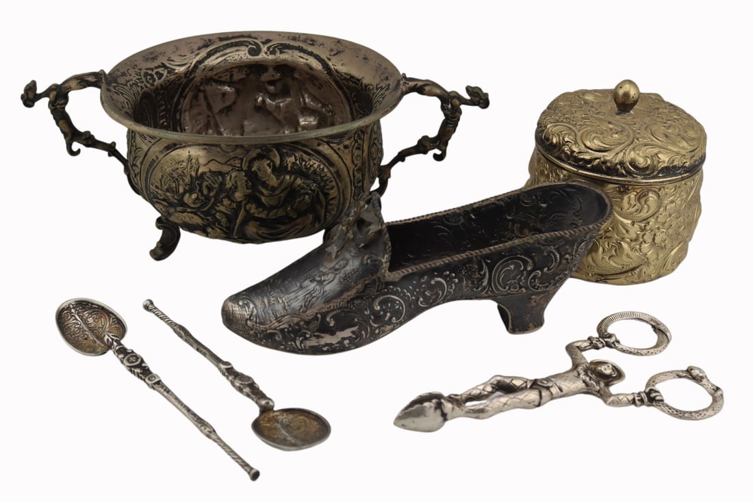 SILVER. Sterling and Continental Silver Objects.: Includes a pair of Gorham sterling jester or harlequin form tongs; (2) Cornelius Saunders and Francis Shepherd English silver spoons - London, 1902; a Theo A. Kohn repousse gilt sterling lidded box; a