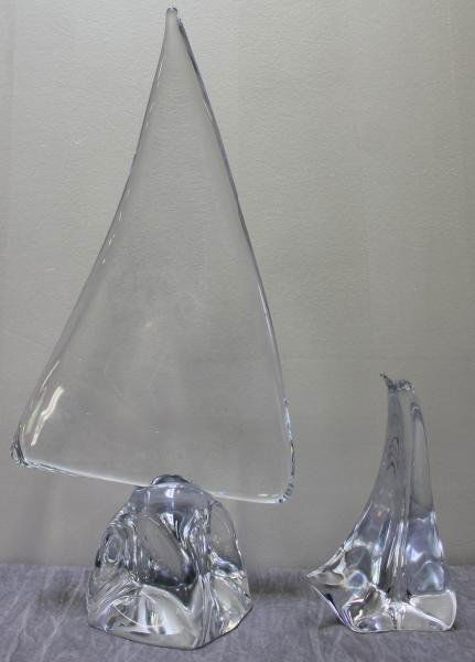 2 Glass Daum Nancy Sculptures.: From a Stamford, CT estate. Dimensions: 8.5" h and 20" h.
