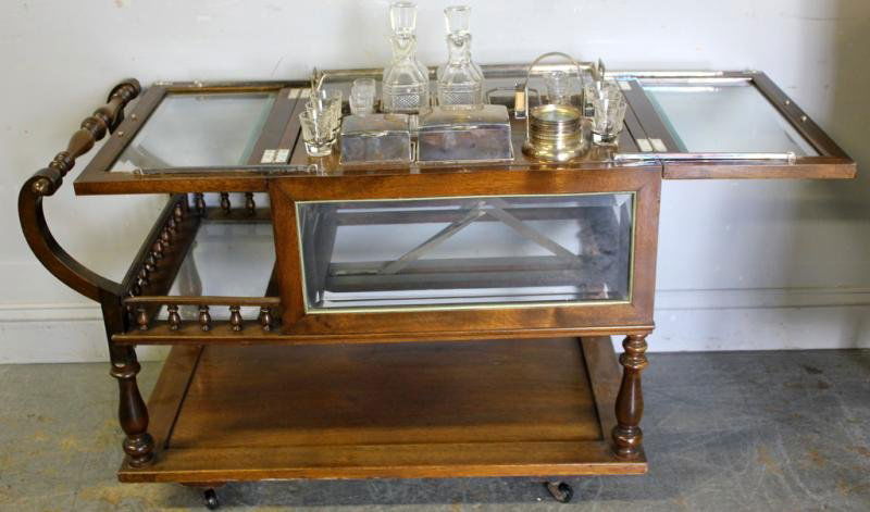 Vintage Pop Up Bar Cart.: With beveled glass removable inner tray and original decanters, etc. Tray is marked made in Austria. Original interior boxes, etc. From a Mamaroneck, NY estate. Dimensions: 36" w x 19" d x 24.25" h.