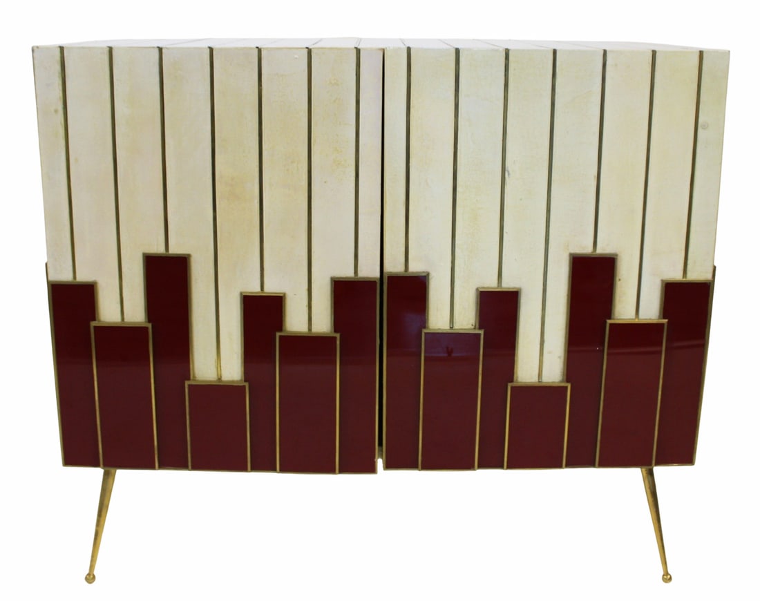 Modernist Italian 2 Door Cabinet.: Nice quality, very stylish with a skyscraper style design and leather and brass trim. From the curated 40+ year collection of Cosulich Interiors and Antiques. - Dimensions: 34" x 39.5" x 19"