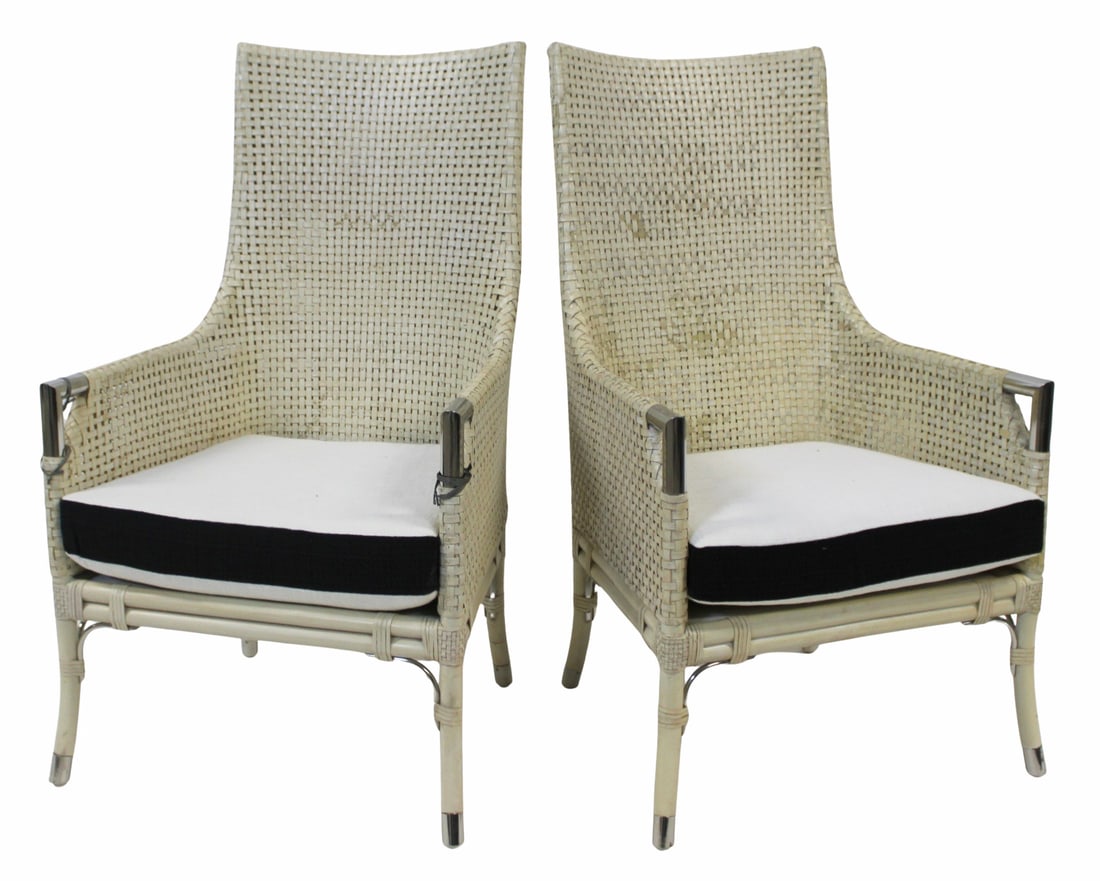 Midcentury Pr of Wicker Basket Weave Chairs with: Chrome Arms and Feet. From the curated 40+ year collection of Cosulich Interiors and Antiques. - Dimensions: 43" x 25" x 23"
