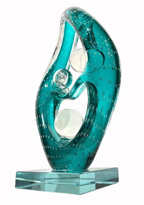1970 Italian Teal Murano Glass "Embrace" Sculpture: "Embrace" Murano glass sculpture, attributed to master glass artist Livio Seguso, captures a poetic sense of movement and unity. Rendered in rich teal glass and the use of the bulicante tech