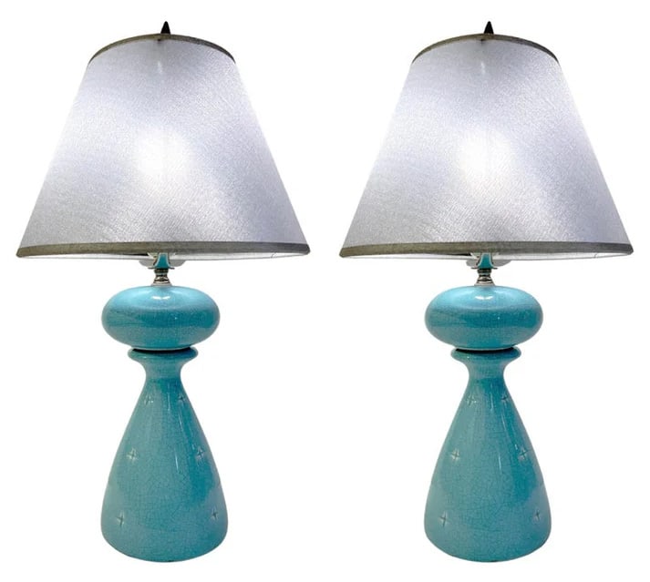 1960s French Pair of Aquamarine Blue Craquelure: Glaze Lamps with Stars. A delightful vintage pair of French ceramic table lamps with Art Deco flair worked with the craquele technique and decorated with indented stars in the bodies. The color in sky