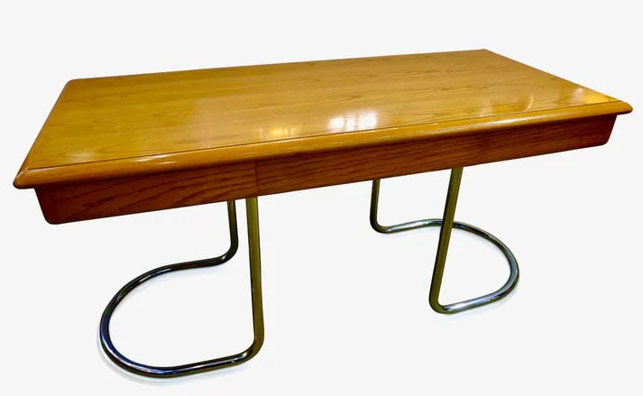 1970s Italian Nickel Legs 3-Drawer Ash Tree Desk: A Mid-Century Modern center desk in ash tree of clean sleek shape, very well designed, the top surface with quality rounded corners and minimum thickness to allow 3 functional drawers, raised on conti
