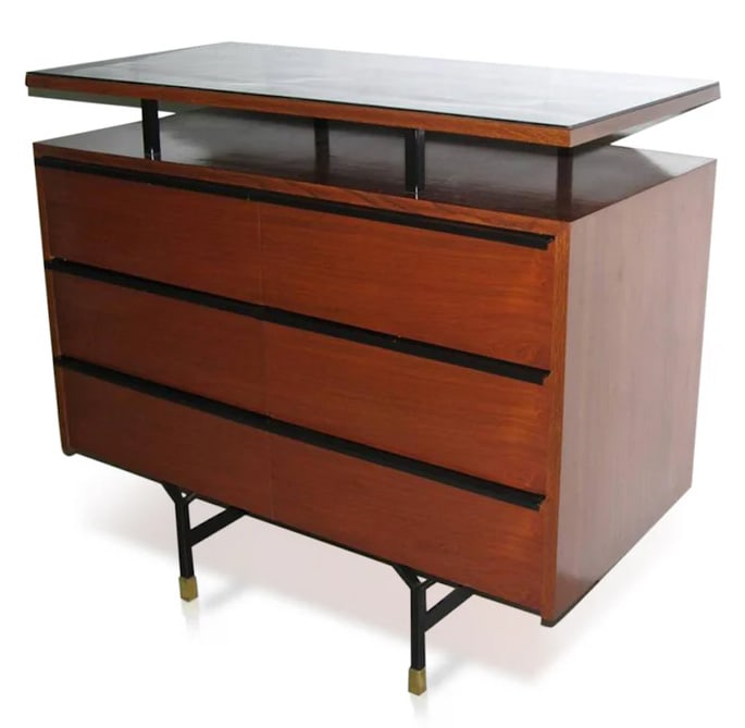 1960s Modern Italian Wood Chest with Shelf.: Sleek modern functional design for this six-drawer dresser finished in high-quality teak wood veneer on sling shaped black lacquered metal legs with a brass foot. The black metal lines on the front cl