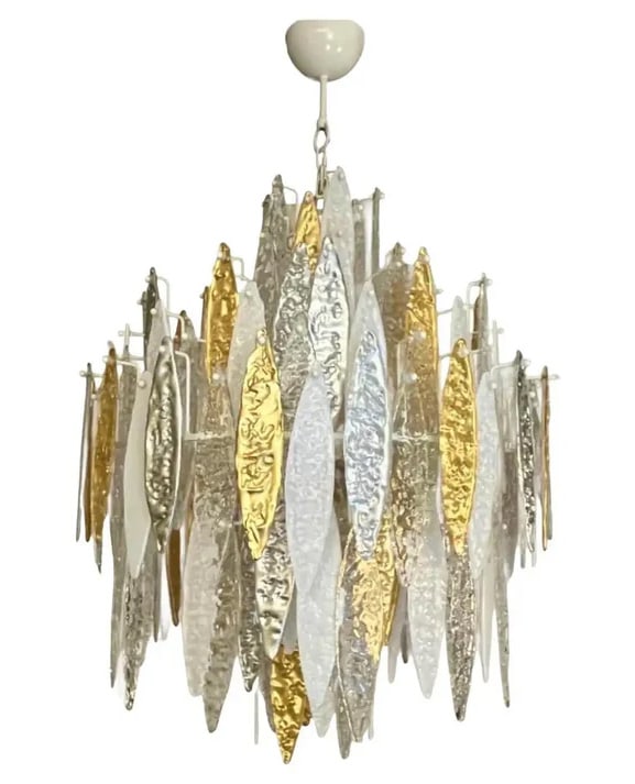 Modern Italian Silver Murano Glass Chandelier.: A unique Italian contemporary icicle chandelier, entirely hand made in Italy, the interchangeable different drops in Murano glass are worked with a hammered texture, concave on one side and in relief