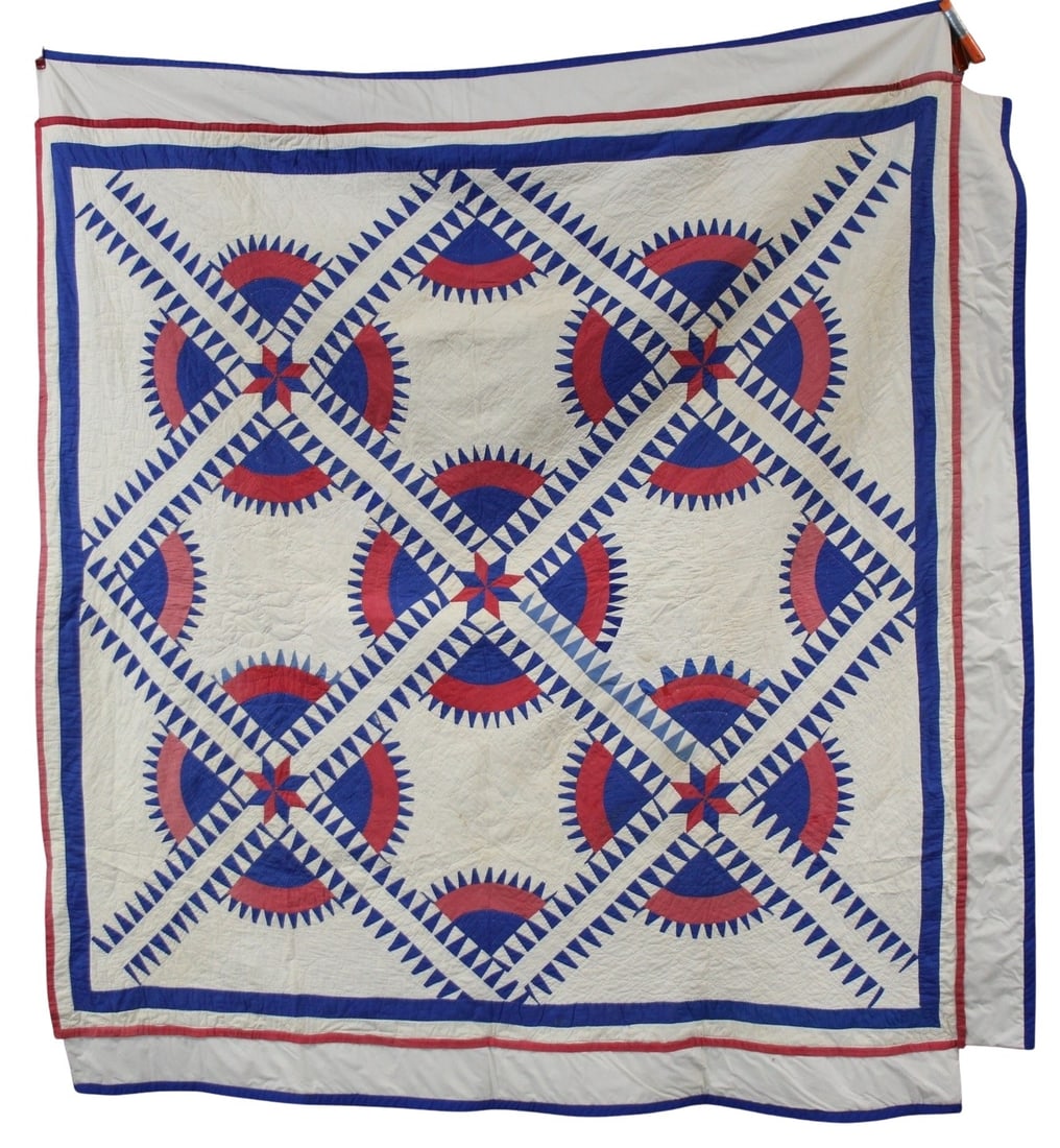 An Antique New York Beauty Quilt: Red and blue decorated quilt. From a Lyme, CT estate. - Dimensions: Appx. 7'1" x 7' 11".
