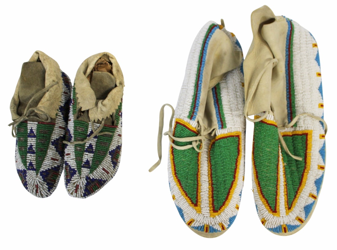2 Prs of Native American Sioux Beaded Moccasins.: Attributed to Sioux - a Child's pair of hide beaded moccasins and a second larger pair. From a NYC estate. - Dimensions: 10" & 6 "