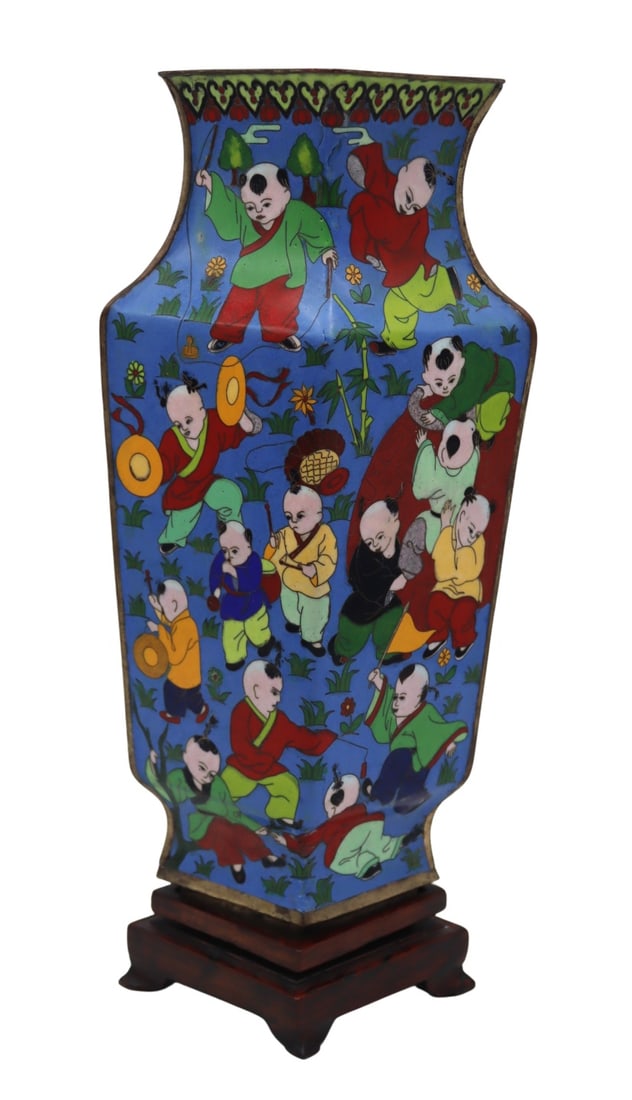 Chinese Cloisonne Vase of Children Playing.: Accompanied by a fitted carved wood base. From a Scarsdale, NY estate. Dimensions: vase measures approx. 6.5" w x 4.5" d x 11.5" h.