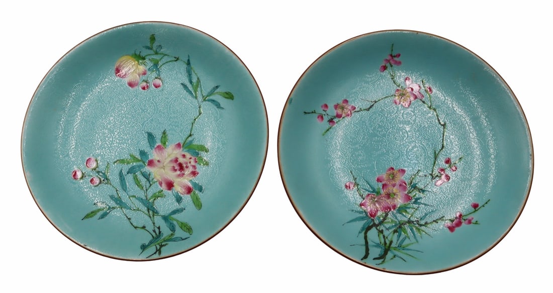 (2) Chinese Turquoise Glaze Sgraffito Dishes with: Flowers. (2) Chinese turquoise glazed Sgraffito dishes accented by enamled decorated depictions of pink flora. With a Qianlong mark to the underside of each dish. From a Rye, NY estate. Dimensions: