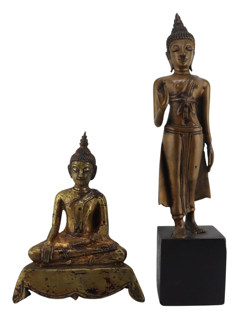 (2) Southeast Asian Buddhas.: Includes a standing figure of a crown Buddha on carved wood base; and a seated gilt bronze Buddha with hands in bhumisparsa and dhyana mudra. From a Rye, NY estate. Dimensions: seated gilt Buddha meas