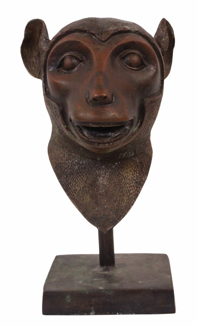 Bronze Monkey Head on Bronze Stand.: From a Ridgewood, NY estate. Dimensions: 7.5" x 7.5" x 16.5" h.
