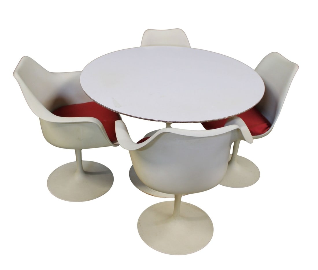EERO SAARINEN (USA 1910-1961).: Eero Saarinen for Knoll Tulip table and 4 chairs. Nice original set with labels. From a Brooklyn, NY estate. Dimensions: table 29" x 42"; chair 32" x 20" x 16".