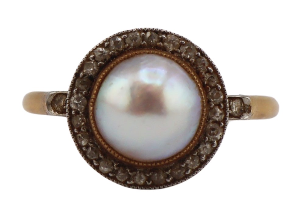 JEWELRY. Signed French 18kt Gold, Platinum, Pearl: and Diamond Ring. Antique signed French platinum topped 18kt yellow gold ring displaying a central bezel set round pearl accented by a surround of single cut diamonds. Additional accents of (2) single