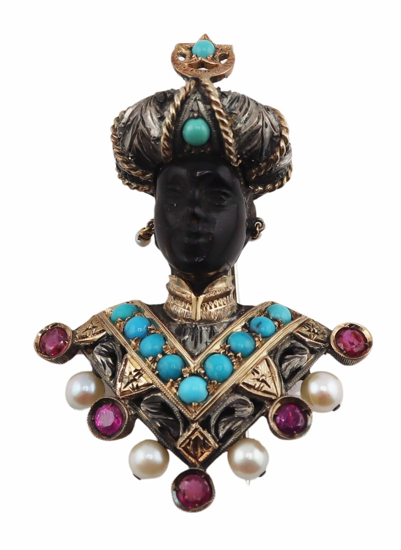JEWELRY. G. Nardi "Moretti" Blackamoor Brooch.: Signed G. Nardi "Moretti" or Blackamoor brooch displaying a carved ebony adorned with a silver and 18kt yellow gold turban accented by turquoise beads and a crescent moon & star pendant,