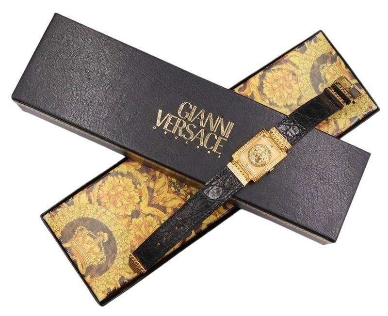 JEWELRY. Vintage Gianni Versace Signature Watch: A men’s vintage Gianni Versace Signature gold-tone quartz watch, Ref. No. 7008020. Accompanied by the outer box, inner box, papers/booklet, and the original sales receipt. From a Scarsdale, NY e
