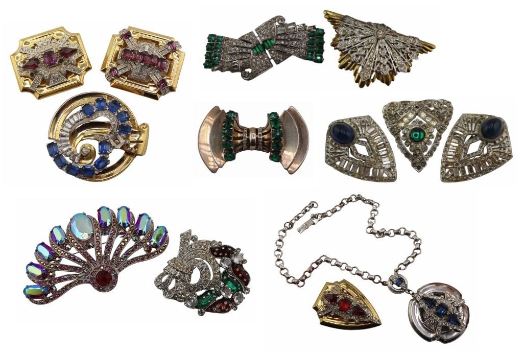 JEWELRY. (13) Pcs. of Jewelry Inc. Eisenberg.: Includes an Eisenberg silver-tone brooch with multi-color faceted rhinestones - circa 1942-1945; an Eisenberg silver-tone brooch with white/clear rhinestones and purple & green panels - circa