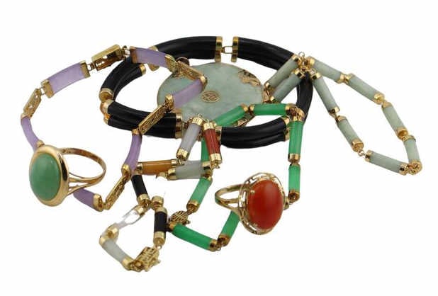 JEWELRY. 14kt Gold and Jade Jewelry Grouping.: Including (3) assorted 14kt yellow gold mounted jade cylindrical-cut bracelets - stamped, "14K 585"; (1) 14kt yellow gold mounted double jade cylindrical-cut bracelet - stamped, "14K 58