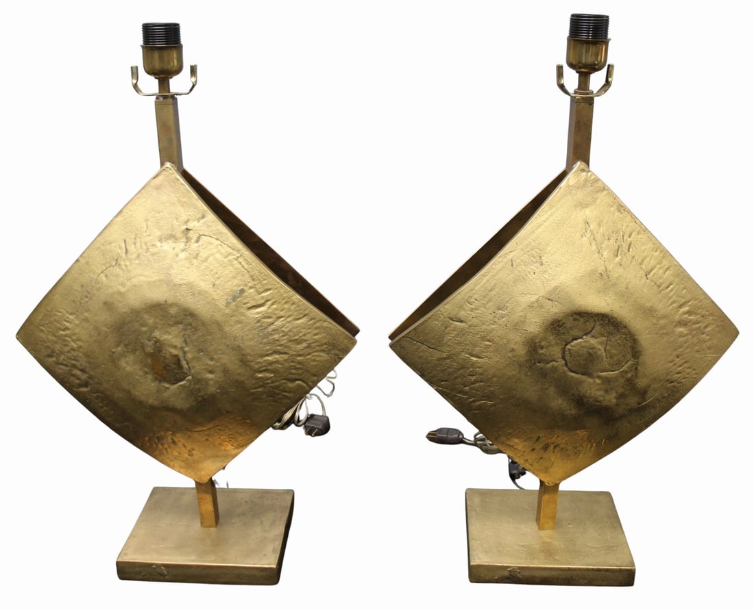 Pair of Brutalist Bronze Mid Century Lamps: A pair of Italian design Brutalist cast bronze double lit lamps. 25" to top of the socket, 16" widest. From the Cosulich Interiors & Antiques collection. - Dimensions: Base 7.75" x 6.625
