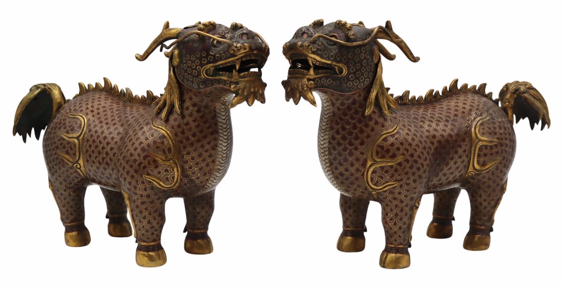 Pair of Chinese Cloisonne Enamel Figures of Qilin.: Pair of Chinese cloisonne multi-color enamel figures of standing Qiln with gilt metal accents. Manes are removable and reveal a hole in the back of the Qilin's neck. From a Woodside, NY estate. Dimens