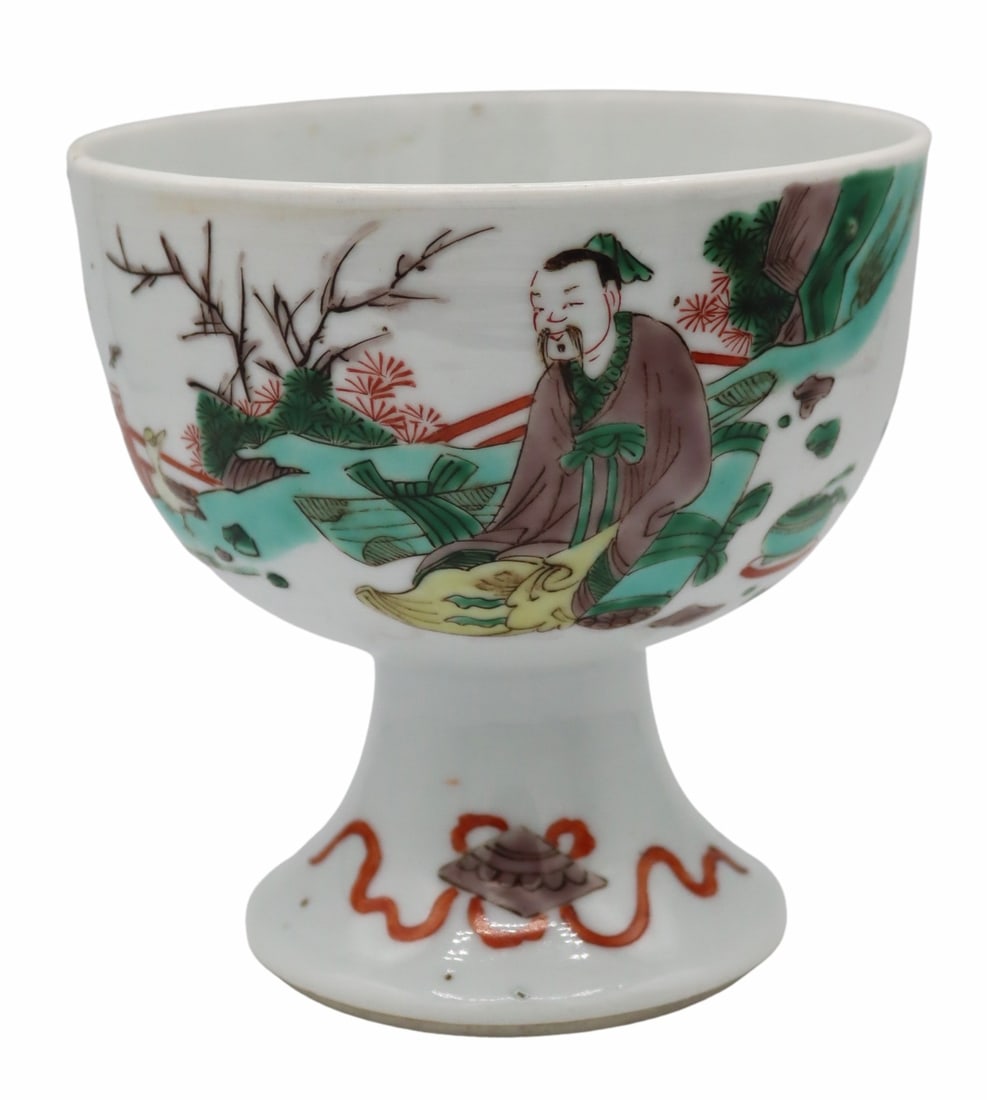 Chinese Famille Verte Stem Cup of Scholar.: Chinese Famille Verte enamel decorated stem cup displaying a seated scholar, possibly Wang Xizhi, with an attendant carrying food and further displaying a single goose. Base is decorated with two prec