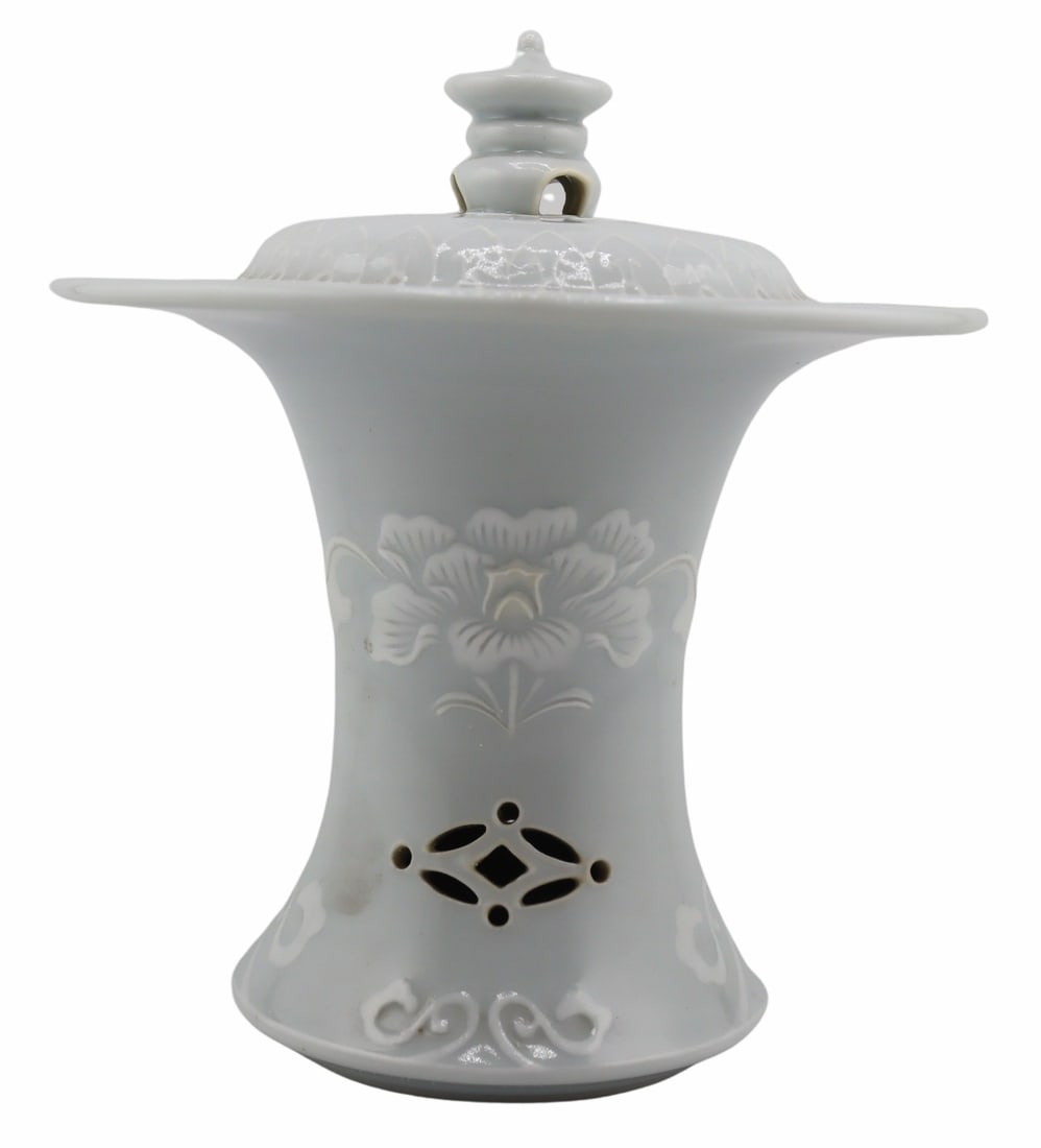 Japanese? White Glazed Lidded Censer.: Japanese? white on white glazed lidded censer with pierced decoration and chrysanthemum accents. Displaying a four character mark to the underside. From a Cliffside Park, NJ estate. Dimensions: lidded