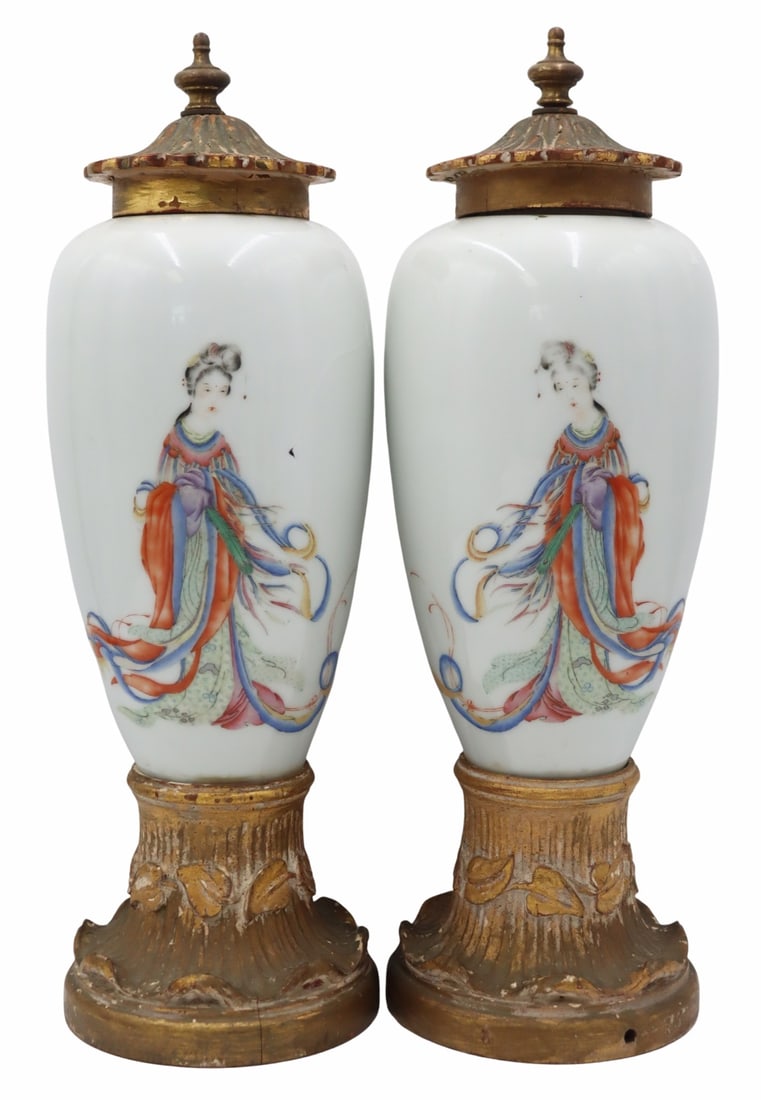 (2) Chinese Famille Rose Jars with Gilt Wood Lids: and Bases. Chinese Famille Rose enamel decorated jars with carved gilt wood bases and lids. From a Cliffside Park, NJ estate. Dimensions: jars with bases and lids measure approx. 16.25" h to the