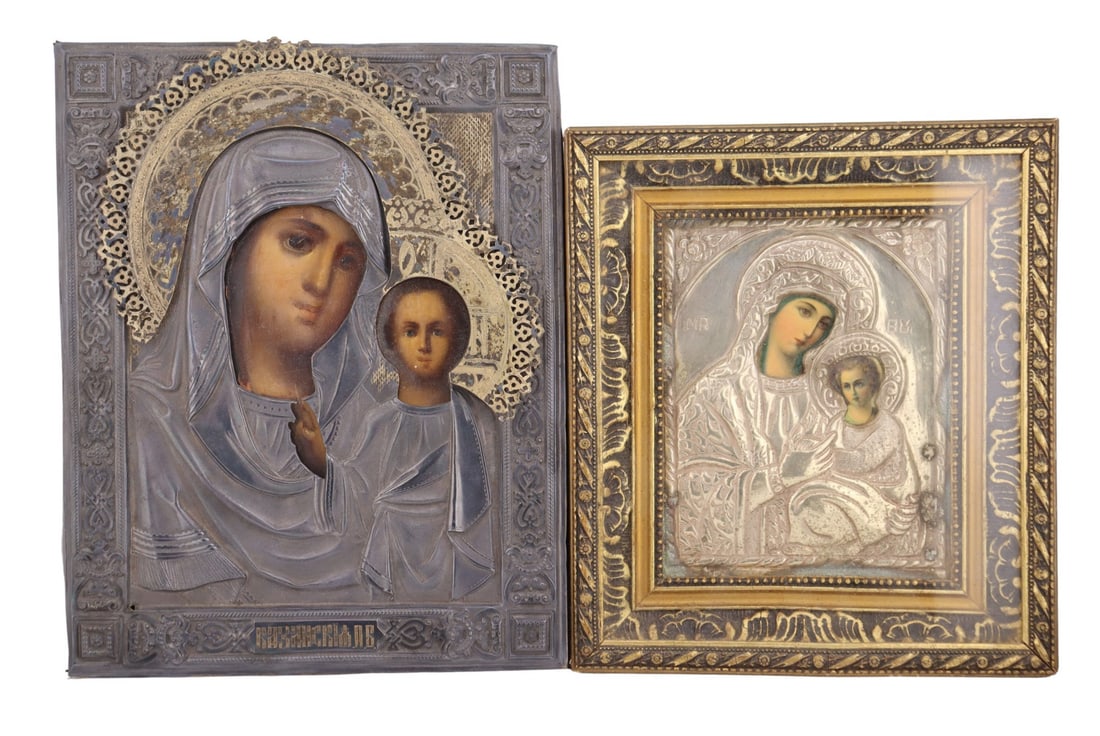 Russian .875 Silver Gilt Oklad Icon.: A Russian icon depicting the Mother of God of Kazan type, oil on board, housed within a finely worked .875 silver oklad. The removable silver cover features traditional repousse and decoration with