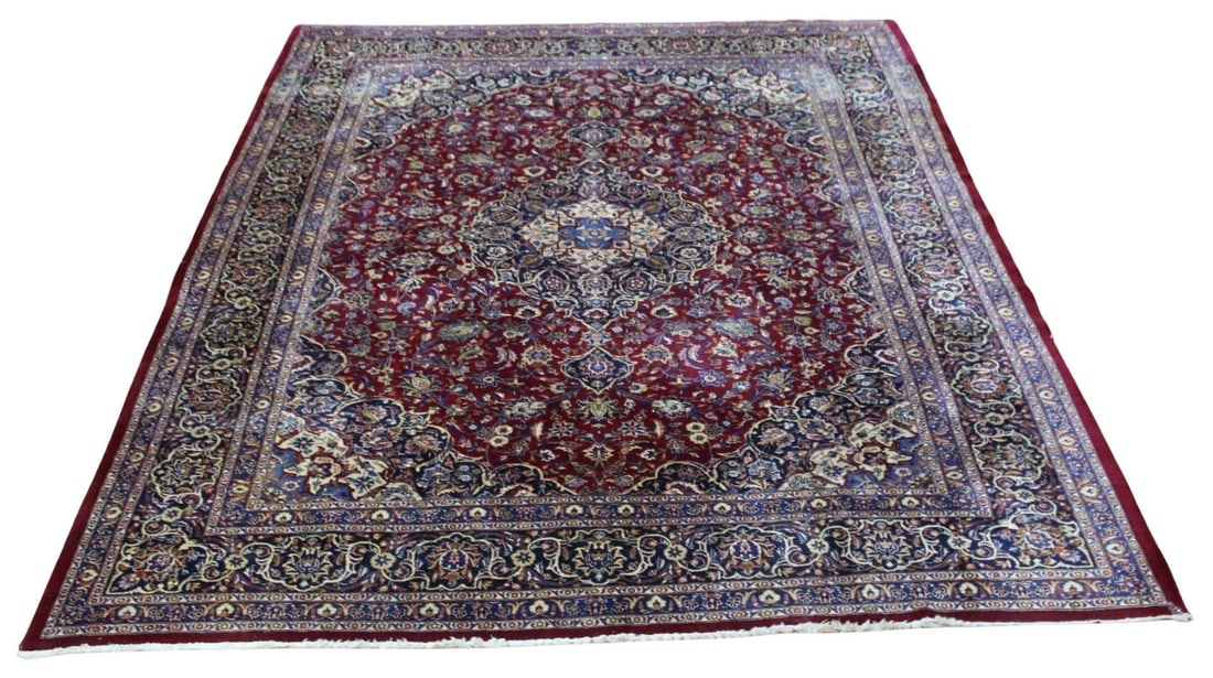 Vintage And Finely Hand Knotted Kashan Carpet.: Large, fine weave, center medallion and overall red color. From an East 72 st NYC estate. - Dimensions: 9ft 7" x12ft 7".