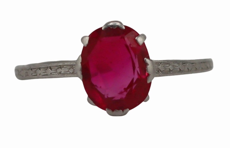 JEWELRY. Platinum and Pink Faceted Gem Ring.: In the process of obtaining a GIA Gem Identification report. Total approx. weight of the ring is 1.7 dwt (gross). Ring size - 5. From a Kent, CT estate. Dimensions: ring face measures approx. 0.32&quo