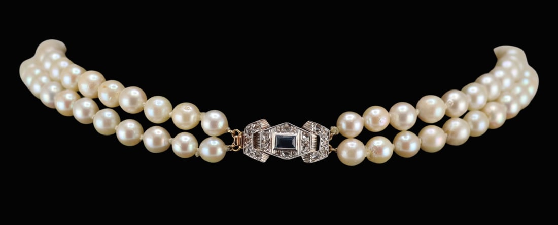 JEWELRY. Platinum Topped 17kt Pearl Diamond and: Gem Necklace. Individually knotted double strand graduated pearl necklace with a platinum topped 17kt yellow gold clasp displaying a central bezel set blue faceted gem surrounded by rose cut diamonds.