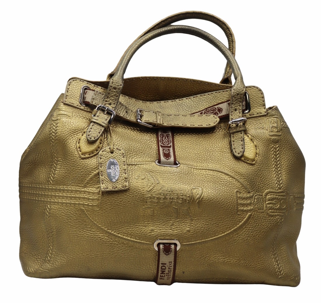 COUTURE. Fendi Selleria Villa Borghese Leather: Purse. Gold leather tote bag with silver-tone hardware and impressed horse. Interior silver-tone label stating, "Fendi Selleria lavorazione a mano Serie Numerata No 49-22825 1925 Roma