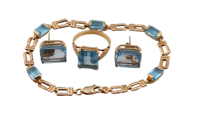 JEWELRY. Gold and Topaz Jewelry Grouping.: Including an unmarked 14kt yellow gold ring with central prong-set topaz - size 5 3/4; a 14kt yellow gold bracelet with (6) prong set topaz accents; and a pair of 14kt yellow gold - studs - each with