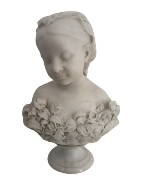 THOMAS BALL (USA , 1819-1911).: Marble bust of pensive child with braided hair adorned with pansies. From a Long Island, NY estate. - Dimensions: 19" h x 13" w.