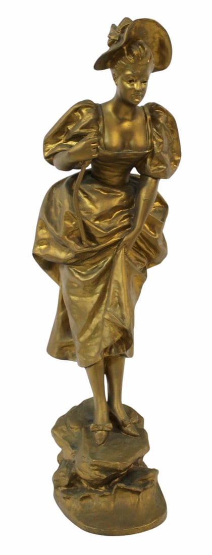 GUSTAVO OBIOLS (Spain, 1858-1910).: Gilt bronze sculpture of lady in a bonnet. Signed on base. From a Nyack, NY estate. - Dimensions: 24" h