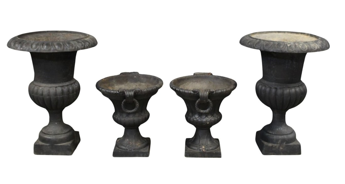 2 Pairs Of Black Cast Iron Garden Urns.: A tall pedestal pair, heavy quality, fluted and a pair with handles. From a New Rochelle, NY estate. - Dimensions: 18.5" h x 20" w & 30.5" h x 22" w.