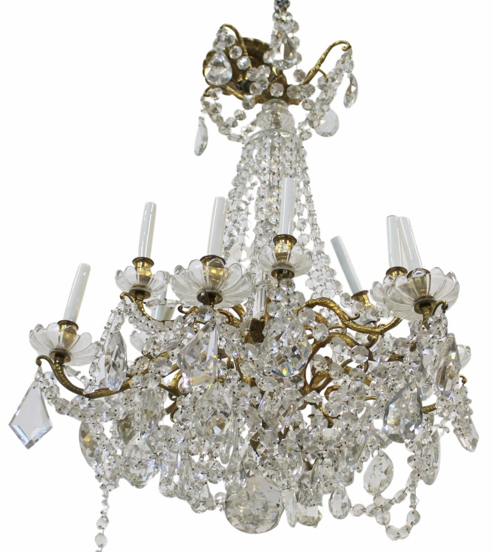 After Baccarat Fine & Large Gilt Bronze Chandelier: The best of quality, large and with nice patina on the bronze. Apparently unsigned. From a Glen Cove, Long Island estate. - Dimensions: 33" h x 28" w.