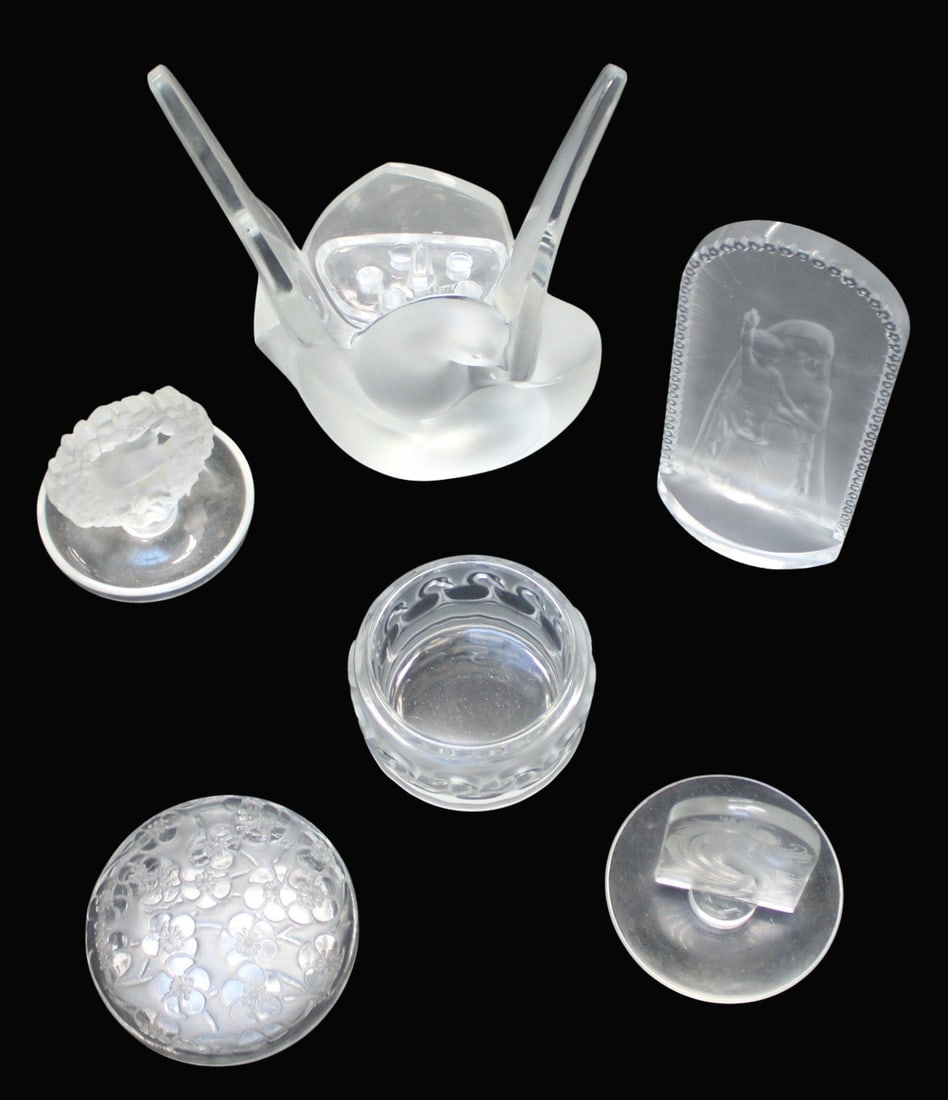 Lalique Lot of Assorted Glass (Six Pieces).: To Include: "Sylvie" vase with flower frog (8 3/8"), ring dish with bird, ring dish with nymph, swan box (cover missing), plaque with Madonna and infant Jesus, covered
