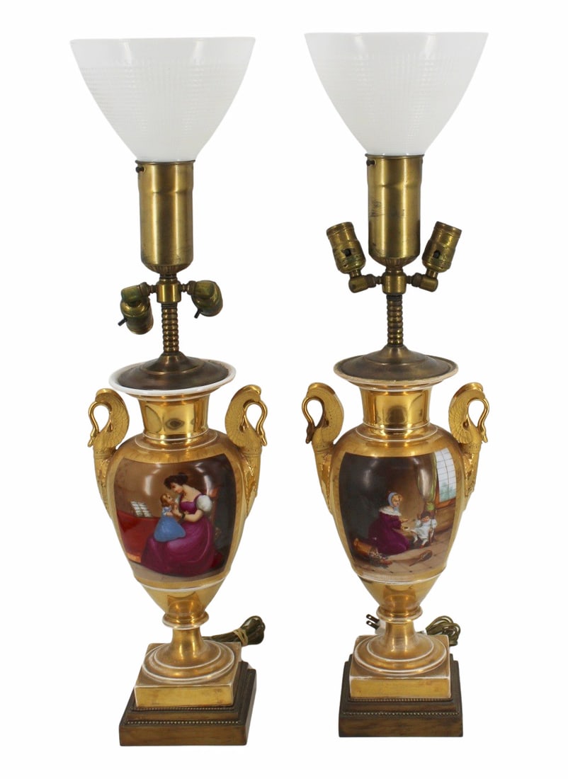Pair of Old Paris Porcelain Urns as Lamps.: Nice pair with great gilt patina, painted scenes and Swan form handles. From a Long Island, NY estate. - Dimensions: 17" h & 31" h to finial