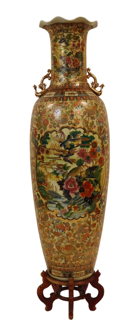 20th C Monumental Chinese Floor Vase.: 20th century Chinese enamel and gilt decorated 'birds and flowers vase' Set atop a carved wood stand. From a Larchmont, NY estate. Dimensions: vase measures approx. 62" h excluding the stand.