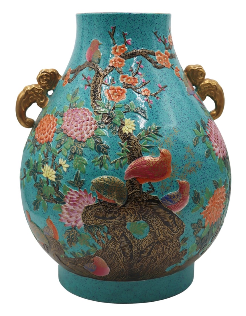 Chinese Famille Rose and Gilt Decorated Vase with: Ruyi Handles. Chinese Famille Rose enamel decorated bulbouse vase with embossed 'birds and flowers' decoration and gilt ruyi form handles. With a mark to the underside. From a Flushing, NY estate. Dim