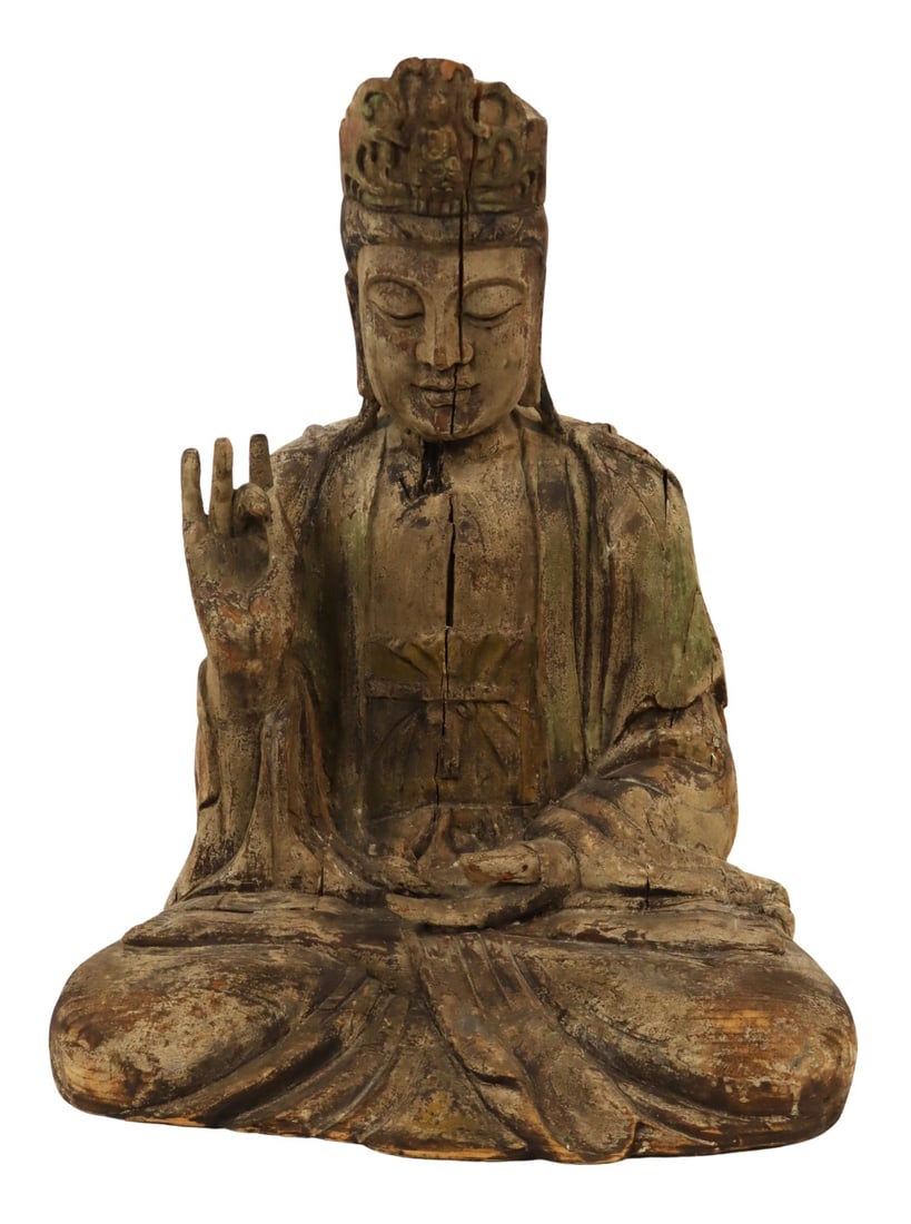 Large SE Asian Carved and Paint Decorated Buddha.: From an E 72nd St, Manhattan estate. Dimensions: Buddha measures approx. 30" h x 24" 2 x 19" d.