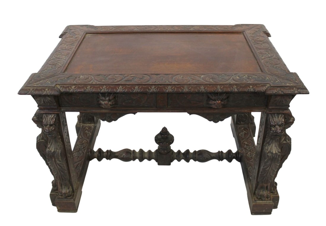 After Horner Highly & Finely Carved Oak Desk.: Nice original desk with 2 drawers, Lion heads and great original patina. From a New Rochelle, NY Estate. - Dimensions: 30.75" h x 49" w x 33.25" d