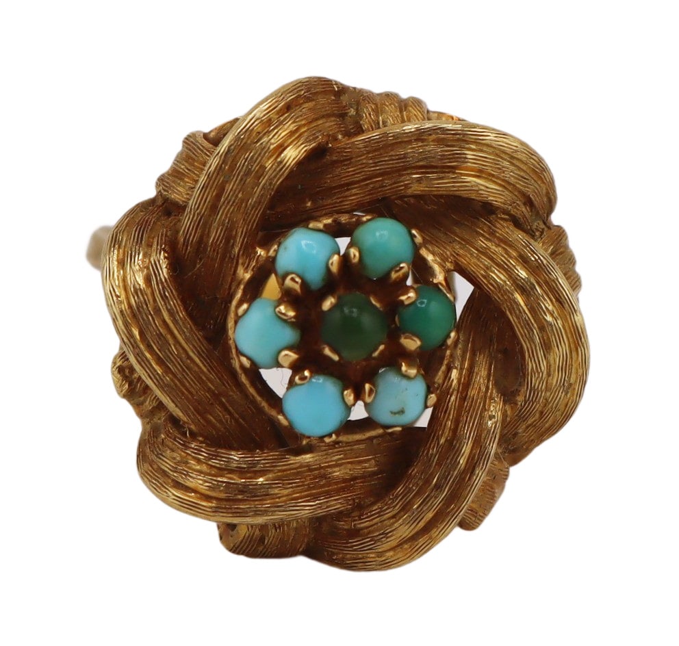 JEWELRY. Italian 18kt Gold and Turquoise Ring.: Italian 18kt yellow gold ring displaying a raised woven pendant accented by a central cluster of turquoise beads and a Florentine finish. Stamped to the interior of the band is, "18K 750