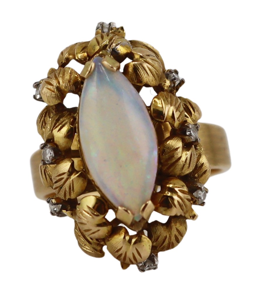JEWELRY. Signed H.K. 14kt Gold Opal and Diamond: Ring. Signed H.K. 14kt yellow gold cocktail ring displaying a central prong-set marquis form opal accented by (8) single cut diamonds set within an organic form pendant. Stamped, "14K