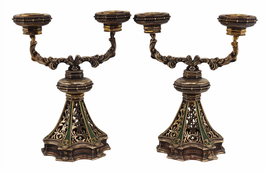 SILVER. Pair of Hungarian Silver Gilt and Enamel: Candelabra. Pair of Hungarian silver gilt two arm candelabra with beautiful tapered base displaying pierced scroll work, panels of green enamel work, and applied shells; with applied florets, and