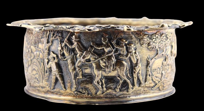 SILVER. George III Britannia Silver Wine Coaster.: A spectacular George III English Britannia .958 gilt silver wine coaster with a wood insert executed in repousse. With city mark of London, maker's mark of Edward Farrell, and a date letter of 1817. T